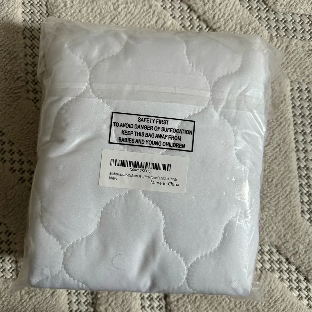 Halo bassinet mattress pad
